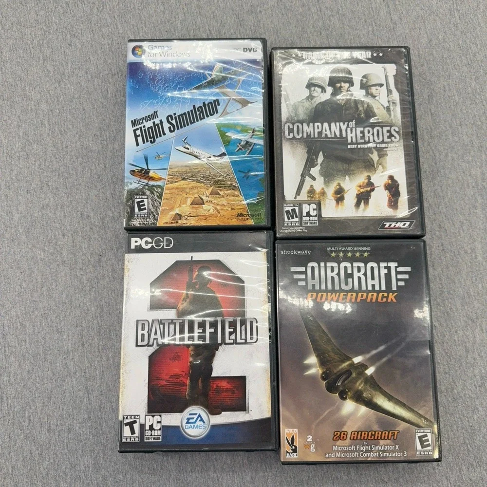 Lot Of 7 PC Games:  Battlefield 2, Flight Simulator, Rayman, Iron Aces, etc.
